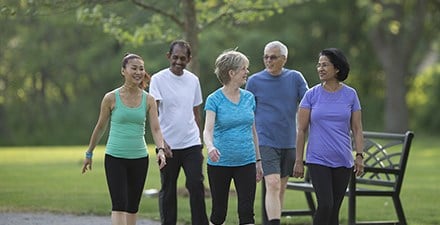 Adults walking outdoors