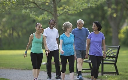Adults walking outdoors