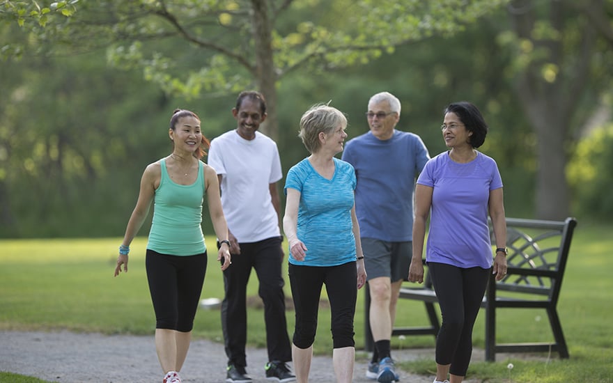 Adults walking outdoors