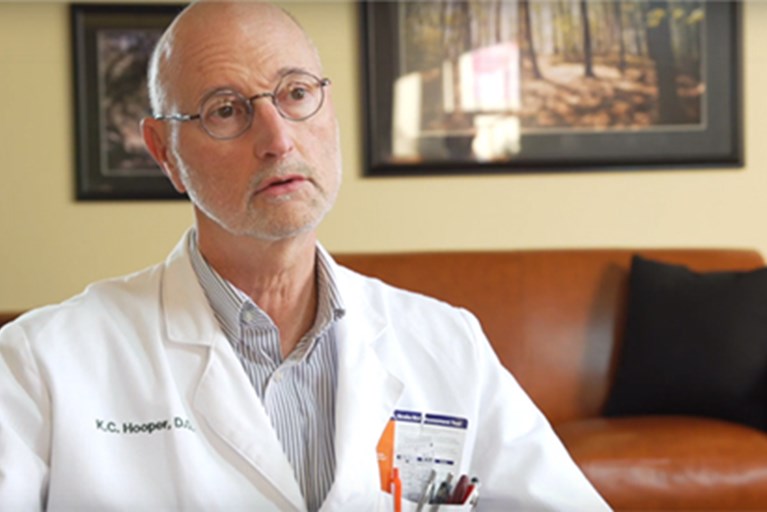A doctor on video, describing post-surgical opioid dependency.