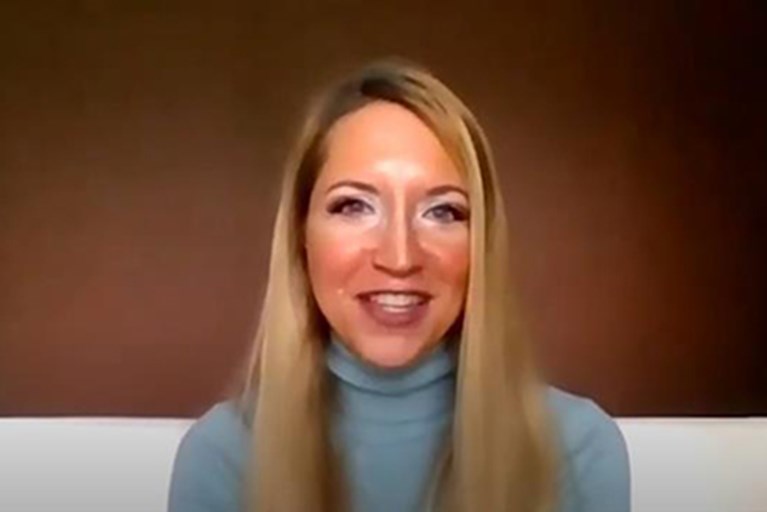 A physical therapist on video, explaining children's activities.