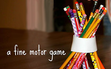 A stack of pencils inside a band for a game.
