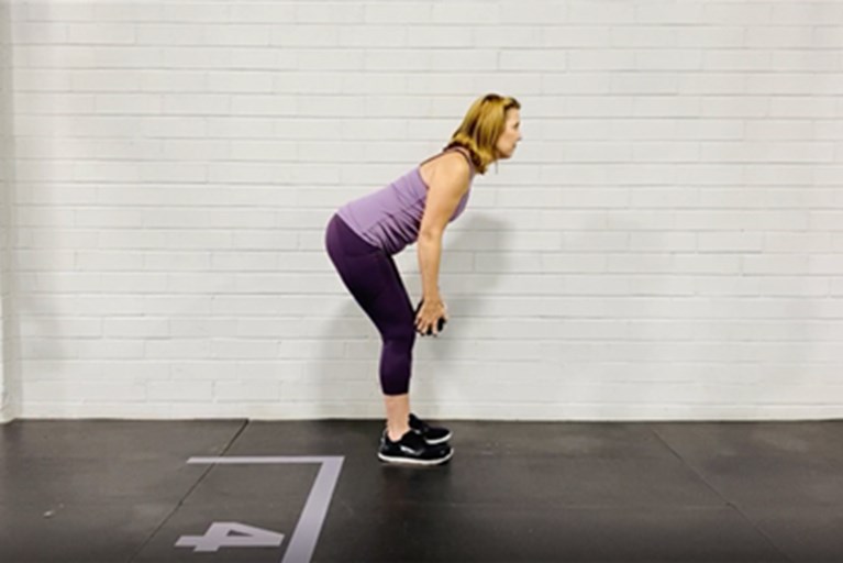 A physical therapist demonstrats strengthening exercises safe for older adults who walk without assistance.