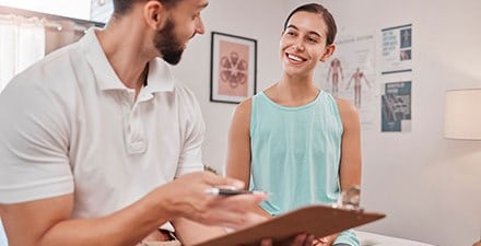 Physical therapist conducting a patient/client evaluation