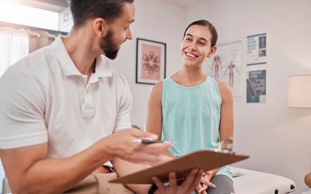 Physical therapist conducting a patient/client evaluation