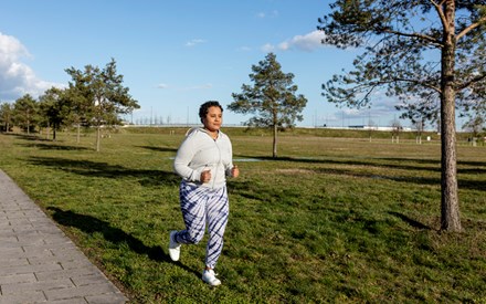 Black woman walking briskly