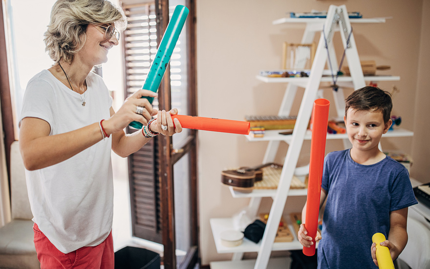 A physical therapist uses music and dancing as part of therapy.