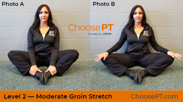 A physical therapist shows how to do a groin stretch.