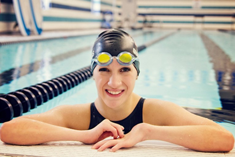 Alyssa Gialamas, a paralympic swimmer,  in the pool.