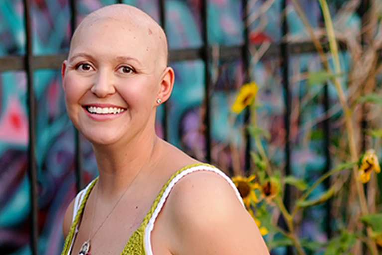 A cancer survivor outside.