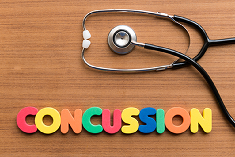 The word concussion spelled out in colored letters.