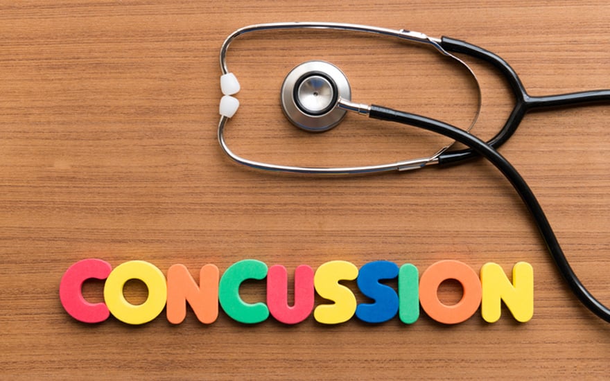 The word concussion spelled out in colored letters.