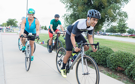 Cyclists riding on the road.