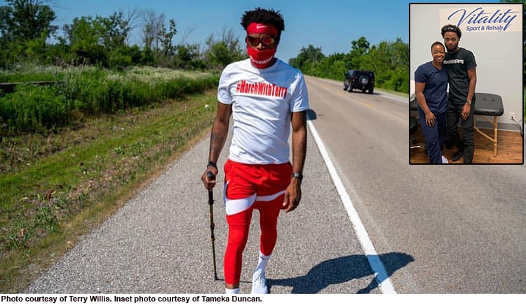 Terry Willis, a black man walking on the road during his 1,000-mile walk for justice.