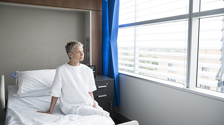 A person in a hospital bed.