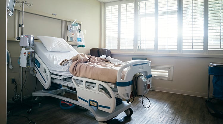 Hospital room with bed.
