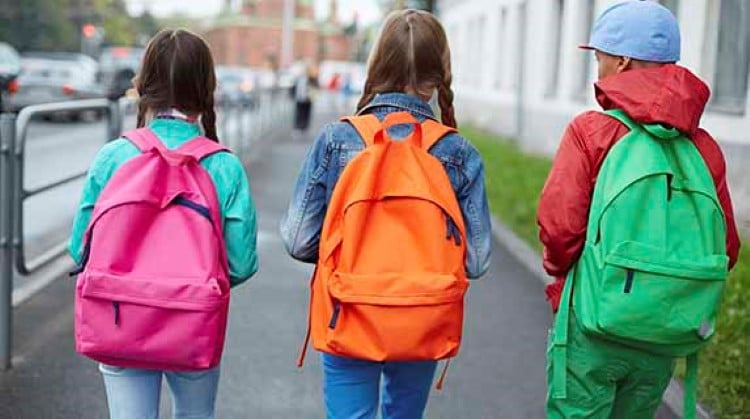 Kids walking with backpacks