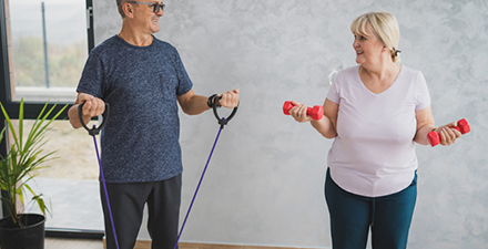 Two people doing strengthening exercises