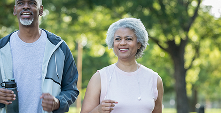 A couple enjoying a vigorous walk.