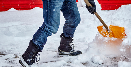 A person shoveling snow.