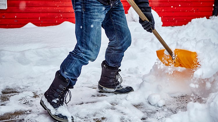 A person shoveling snow.